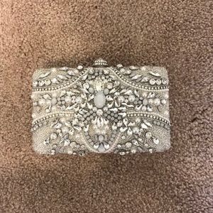 Embellished white clutch